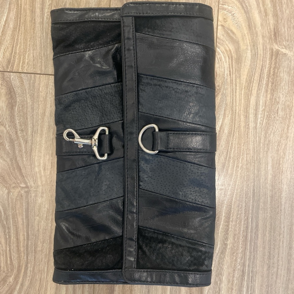 Women’s black clutch